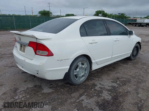 2011 Honda Civic LX with VIN 2HGFA1F56BH527671, listed as a IAAI auction lot 42166647 with 162,969 mi miles and . Bid and sale history available at DreamBid. Image 4.
