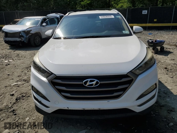 2016 Hyundai Tucson SE z VIN KM8J3CA49GU243481, wystawiony jako Copart lot #54656555 z przebiegiem 124 872 mil mil oraz Szkoda całkowita • Salvage title. Historia ofert i sprzedaży dostępna na DreamBid. Obrazek 5.
