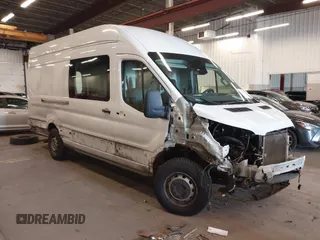 2021 Ford Transit Cargo z VIN 1FTBW3X87MKA60727, wystawiony jako IAAI lot #41701879 z przebiegiem 76 052 mil mil oraz . Historia ofert i sprzedaży dostępna na DreamBid. Obrazek 1.