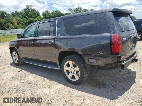 2015 Chevrolet Suburban LTZ with VIN 1GNSCKKC7FR552173, listed as a Copart auction lot 63483995 with 250,564 mi miles and Salvage title. Bid and sale history available at DreamBid. Image 2.
