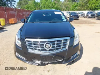 2013 Cadillac XTS Premium z VIN 2G61S5S34D9127996, wystawiony jako IAAI lot #41978539 z przebiegiem 185 157 mil mil oraz . Historia ofert i sprzedaży dostępna na DreamBid. Obrazek 12.