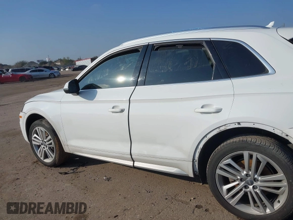 2018 Audi Q5 Premium Plus with VIN WA1BNAFY1J2220714, listed as a IAAI auction lot 41209386 with 70,012 mi miles and . Bid and sale history available at DreamBid. Image 13.