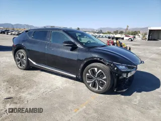 2022 Kia EV6 Wind with VIN KNDC34LA1N5055731, listed as a Copart auction lot 69459954 with 47,919 mi miles and Salvage Title. Bid and sale history available at carsss.com. Image 4.