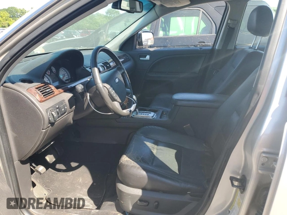 2006 Ford Five Hundred Limited с VIN 1FAHP251X6G169668, выставлен на аукционе Copart как лот 57578865 с пробегом 165 946 миль миль и Списание • Salvage title. История ставок и продаж доступна на DreamBid. Изображение 7.