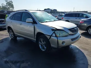 2006 Lexus RX 400h with VIN JTJGW31U260004881, listed as a IAAI auction lot 41641043 with 299,563 mi miles and . Bid and sale history available at DreamBid. Image 1.