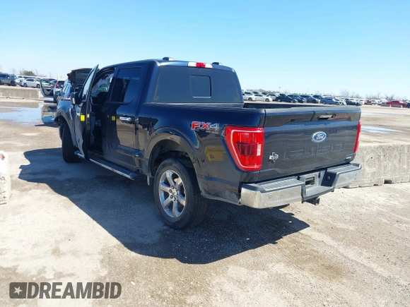 2022 Ford F-150 XL with VIN 1FTFW1E82NKD87353, listed as a IAAI auction lot 41769006 with 69,913 mi miles. Bid and sale history available at carsss.com. Image 3.
