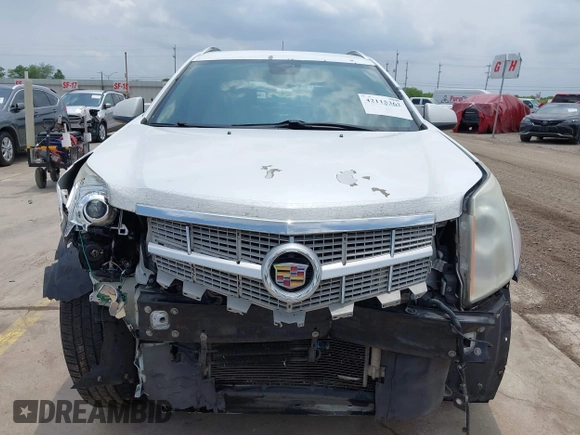 2012 Cadillac SRX Premium Collection с VIN 3GYFNCE36CS557597, выставлен на аукционе IAAI как лот 42115362 с пробегом 122 434 миль миль и . История ставок и продаж доступна на DreamBid. Изображение 13.