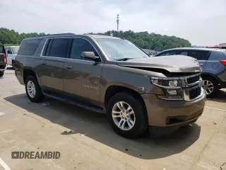 2015 Chevrolet Suburban LS with VIN 1GNSCHKC8FR628406, listed as a Copart auction lot 60682805 with 195,151 mi miles and Salvage title. Bid and sale history available at DreamBid. Image 4.