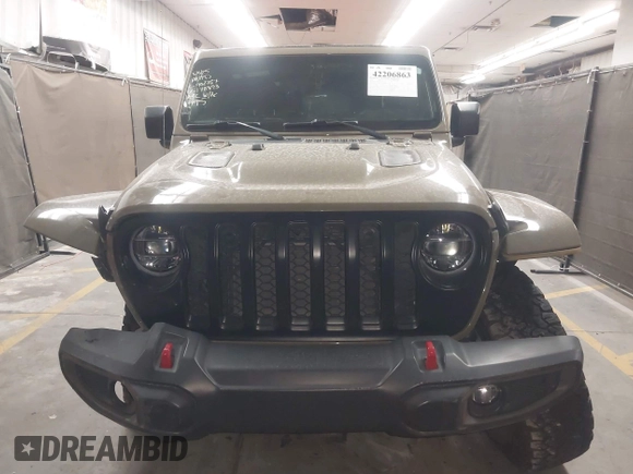 2020 Jeep Gladiator Rubicon z VIN 1C6JJTBGXLL178893, wystawiony jako IAAI lot #42206863 z przebiegiem 29 138 mil mil oraz . Historia ofert i sprzedaży dostępna na DreamBid. Obrazek 13.