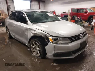 2014 Volkswagen Jetta TDI w/Premium with VIN 3VWLL7AJ9EM432169, listed as a IAAI auction lot 41597229 with 198,930 mi miles and . Bid and sale history available at DreamBid. Image 1.