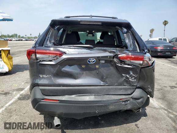 2024 Toyota RAV4 Hybrid LE with VIN JTMMWRFV7RD233242, listed as a Copart auction lot 60878815 with 11,064 mi miles and Salvage title. Bid and sale history available at DreamBid. Image 6.