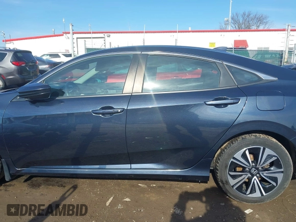 2017 Honda Civic Sedan EX-L with VIN 19XFC1F79HE020486, listed as a IAAI auction lot 41694311 with 77,391 mi miles. Bid and sale history available at carsss.com. Image 14.