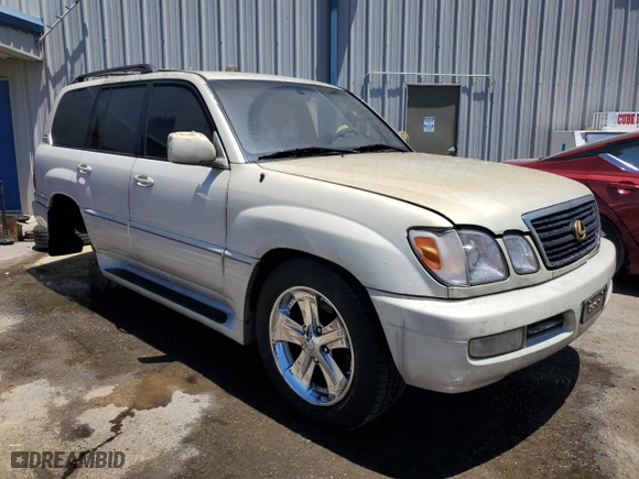 2001 Lexus LX 470 with VIN JTJHT00W613501194, listed as a Copart auction lot 58038914 with 312,193 mi miles and Salvage Title. Bid and sale history available at carsss.com. Image 4.