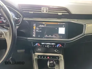 2023 Audi Q3 S line Premium с VIN WA1DECF38P1102974, выставлен на аукционе IAAI как лот 42852727 с пробегом 45 357 миль миль и . История ставок и продаж доступна на DreamBid. Изображение 5.