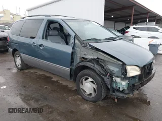 2001 Toyota Sienna LE with VIN 4T3ZF13C01U323995, listed as a IAAI auction lot 41472484 with 232,667 mi miles. Bid and sale history available at carsss.com. Image 1.