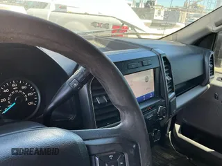 2020 Ford F-150 XL with VIN 1FTEW1E4XLKD47057, listed as a IAAI auction lot 42027310 with 158,735 mi miles. Bid and sale history available at carsss.com. Image 1.