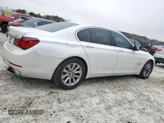 2013 BMW 7 Series 740i with VIN WBAYA6C51DD143769, listed as a Copart auction lot 41965165 with 158,686 mi miles and Clean Title. Bid and sale history available at carsss.com. Image 3.