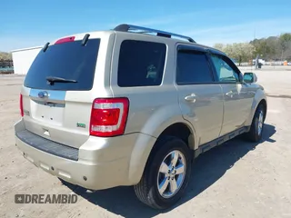 2011 Ford Escape Limited with VIN 1FMCU9EG7BKA25766, listed as a IAAI auction lot 41810992 with 74,226 mi miles. Bid and sale history available at carsss.com. Image 4.