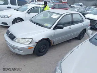 2002 Mitsubishi Lancer ES with VIN JA3AJ26E62U060214, listed as a IAAI auction lot 40961872 with 150,399 mi miles. Bid and sale history available at carsss.com. Image 2.