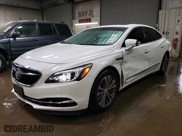 2017 Buick LaCrosse Essence with VIN 1G4ZP5SS1HU113499, listed as a Copart auction lot 52133555 with 154,794 mi miles and Salvage Title. Bid and sale history available at DreamBid. Image 1.