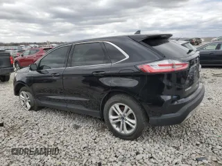 2020 Ford Edge SEL with VIN 2FMPK4J91LBB66541, listed as a Copart auction lot 51804255 with 128,900 mi miles and Salvage Title. Bid and sale history available at carsss.com. Image 2.