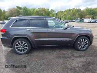2018 Jeep Grand Cherokee High Altitude with VIN 1C4RJFCGXJC440470, listed as a IAAI auction lot 40459789 with 126,854 mi miles and . Bid and sale history available at DreamBid. Image 13.