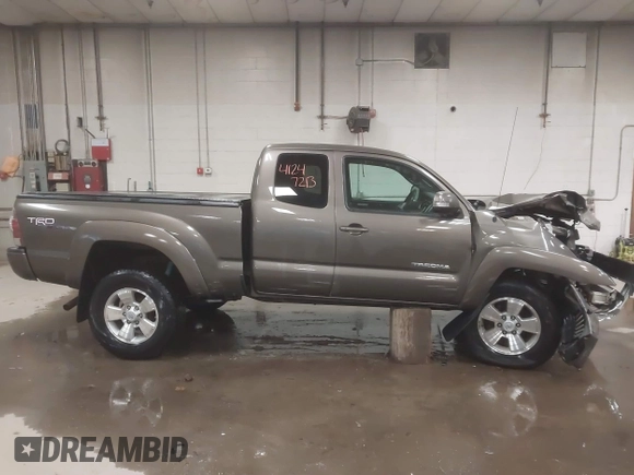 2013 Toyota Tacoma with VIN 5TFUU4EN3DX055489, listed as a IAAI auction lot 41247213 with 58,570 mi miles and . Bid and sale history available at DreamBid. Image 14.