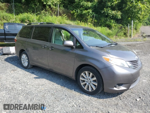 2015 Toyota Sienna LE with VIN 5TDJK3DC0FS112243, listed as a Copart auction lot 61791405 with 86,039 mi miles and Salvage title. Bid and sale history available at DreamBid. Image 4.