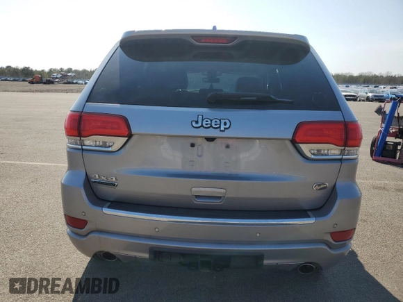 2018 Jeep Grand Cherokee Overland z VIN 1C4RJFCM3JC401399, wystawiony jako Copart lot #53167035 z przebiegiem 87 886 mil mil oraz Nie do naprawy • Non repairable. Historia ofert i sprzedaży dostępna na DreamBid. Obrazek 6.