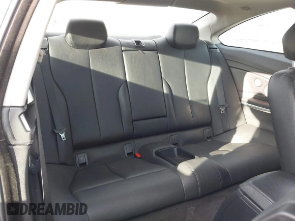 2014 BMW 4 Series 428i with VIN WBA3N7C5XEF719384, listed as a IAAI auction lot 41694678 with 115,517 mi miles and . Bid and sale history available at carsss.com. Image 8.
