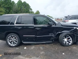 2016 GMC Yukon Denali with VIN 1GKS1CKJXGR254306, listed as a IAAI auction lot 39953539 with 164,149 mi miles. Bid and sale history available at carsss.com. Image 13.