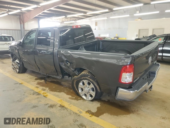 2023 Ram 2500 Big Horn with VIN 3C6UR5DL1PG540186, listed as a Copart auction lot 61088585 with 64,499 mi miles and Salvage title. Bid and sale history available at DreamBid. Image 2.