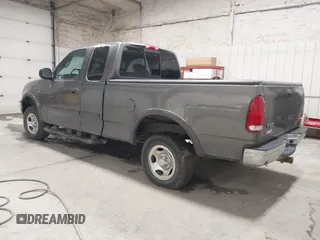 2002 Ford F-150 XL with VIN 1FTRX18W92KA81797, listed as a IAAI auction lot 42250147 with 162,918 mi miles and . Bid and sale history available at DreamBid. Image 3.