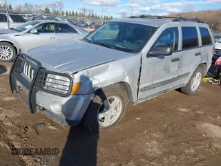 2005 Jeep Grand Cherokee Laredo z VIN 1J4GR48K85C587842, wystawiony jako IAAI lot #41454939 z przebiegiem 108 184 mil mil oraz . Historia ofert i sprzedaży dostępna na DreamBid. Obrazek 18.
