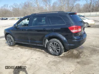 2018 Dodge Journey SE with VIN 3C4PDCABXJT242593, listed as a Copart auction lot 49830085 with 176,553 mi miles and Salvage Title. Bid and sale history available at carsss.com. Image 2.