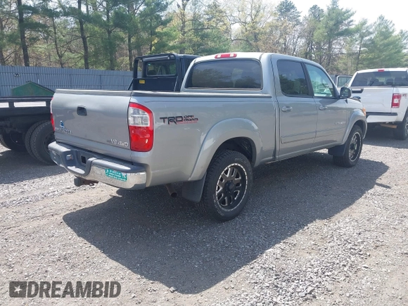 2004 Toyota Tundra SR5 with VIN 5TBDT44174S434897, listed as a IAAI auction lot 42128806 with 218,054 mi miles and . Bid and sale history available at DreamBid. Image 4.
