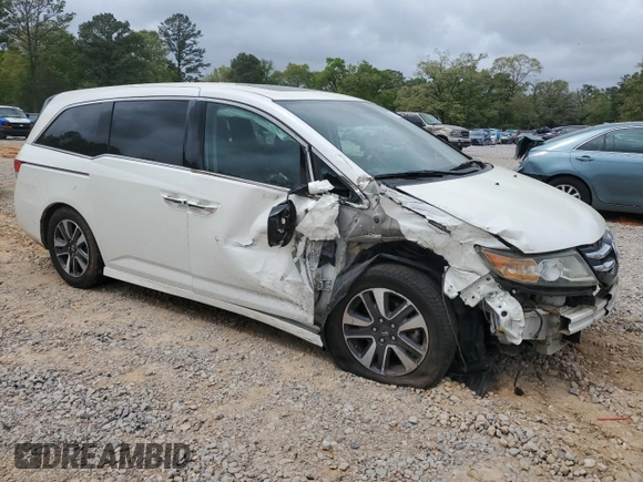 2016 Honda Odyssey Touring Elite with VIN 5FNRL5H91GB075591, listed as a Copart auction lot 51652045 with 126,965 mi miles and Salvage Title. Bid and sale history available at carsss.com. Image 4.