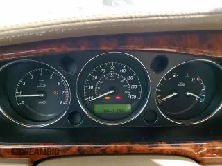 2006 Jaguar XJ Vanden Plas with VIN SAJWA82B16SH06996, listed as a Copart auction lot 62509025 with 80,236 mi miles and Salvage title. Bid and sale history available at DreamBid. Image 9.
