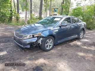 2014 Kia Optima LX with VIN KNAGM4AD0E5064445, listed as a IAAI auction lot 42204163 with 115,976 mi miles and . Bid and sale history available at DreamBid. Image 2.