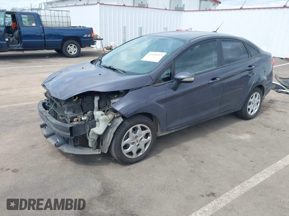 2013 Ford Fiesta SE z VIN 3FADP4BJ3DM186569, wystawiony jako IAAI lot #42128913 z przebiegiem 19 228 mil mil oraz . Historia ofert i sprzedaży dostępna na DreamBid. Obrazek 2.