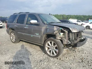 2012 Chevrolet Tahoe LTZ with VIN 1GNSCCE0XCR110507, listed as a Copart auction lot 54269535 with 193,499 mi miles and Salvage title. Bid and sale history available at DreamBid. Image 4.