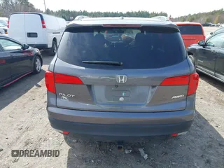 2017 Honda Pilot EX-L with VIN 5FNYF6H5XHB009029, listed as a IAAI auction lot 41883366 with 95,711 mi miles and . Bid and sale history available at DreamBid. Image 16.