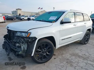 2017 Jeep Grand Cherokee Laredo with VIN 1C4RJEAG1HC720656, listed as a IAAI auction lot 42263500 with 184,239 mi miles and . Bid and sale history available at DreamBid. Image 18.