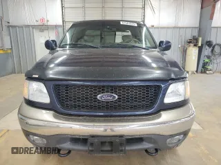 2002 Ford F-150 XL with VIN 1FTRX18L62NA69837, listed as a Copart auction lot 61581935 with 130,078 mi miles and Salvage title. Bid and sale history available at DreamBid. Image 5.