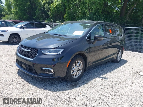 2023 Chrysler Pacifica Touring L with VIN 2C4RC1BG1PR606504, listed as a IAAI auction lot 42647652 with 41,598 mi miles and . Bid and sale history available at DreamBid. Image 2.