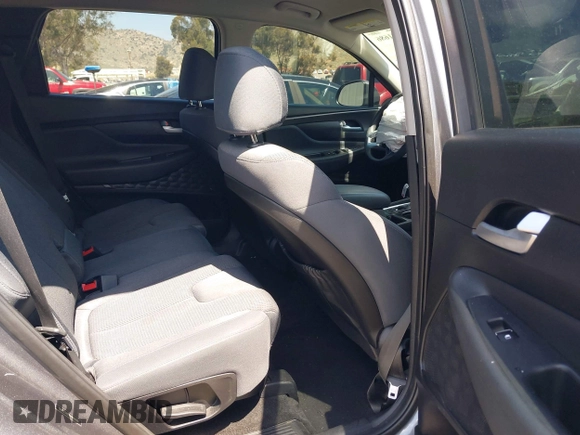 2019 Hyundai Santa Fe SE with VIN 5NMS23AD7KH009688, listed as a IAAI auction lot 41991686 with 77,942 mi miles and . Bid and sale history available at DreamBid. Image 8.
