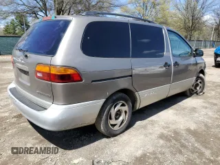 1999 Toyota Sienna LE with VIN 4T3ZF13C2XU112113, listed as a Copart auction lot 52162655 with 248,091 mi miles and Salvage Title. Bid and sale history available at carsss.com. Image 3.