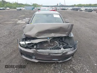 2015 BMW 3 Series 320i with VIN WBA3B1G56FNT63135, listed as a IAAI auction lot 42244926 with Not provided miles and . Bid and sale history available at DreamBid. Image 12.
