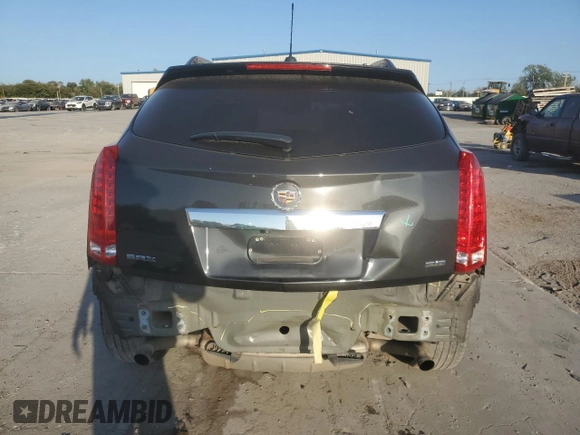 2015 Cadillac SRX Premium Collection with VIN 3GYFNDE34FS611912, listed as a Copart auction lot 74759344 with 127,802 mi miles and Salvage Title. Bid and sale history available at carsss.com. Image 6.