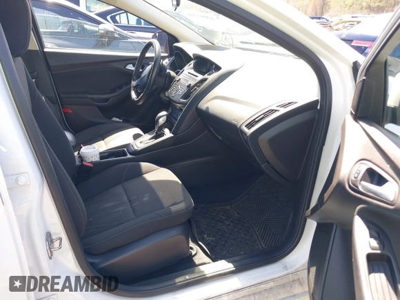 2016 Ford Focus SE with VIN 1FADP3F21GL273440, listed as a IAAI auction lot 42097390 with 131,781 mi miles and . Bid and sale history available at DreamBid. Image 5.